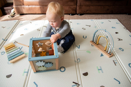 Play Mats VS Baby Gyms: The Competition